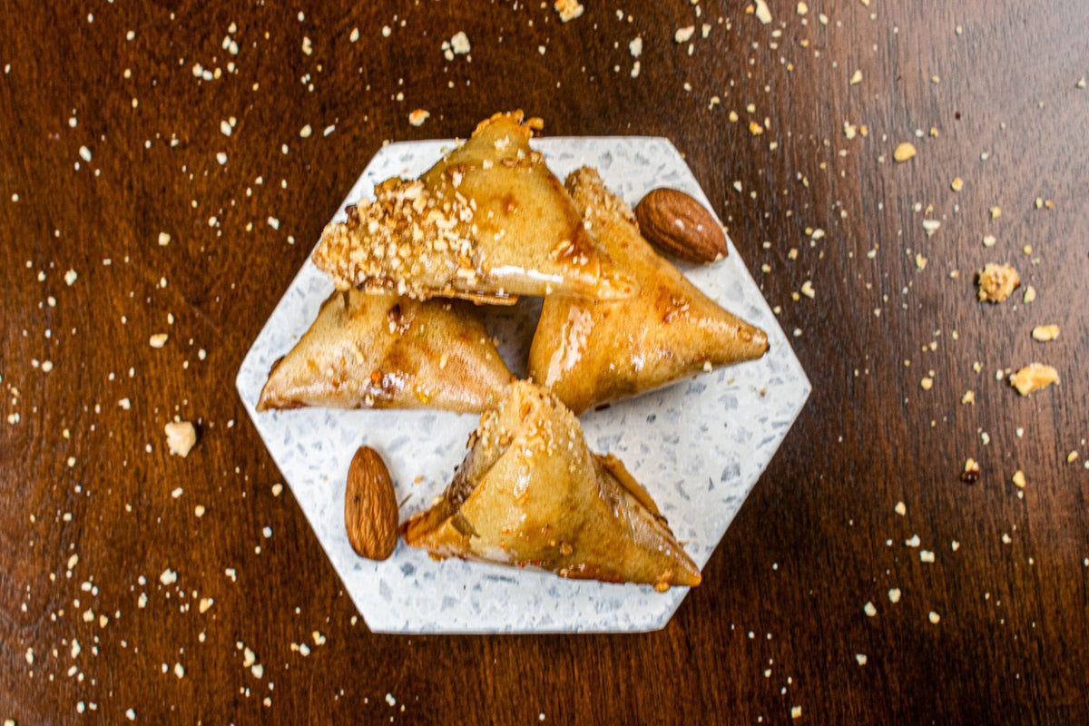 We are one of the most popular Moroccan traditional pastries in Marakesh, Morocco since 1941. We are sharing the taste of Morocco through the moroccan cuisine. We are selling the best and most authentic Moroccan cookies, Moroccan sweets, Moroccan desserts.Such as Chebakya, ghriba, gazelle horns, fekkas, briwat, Mhancha