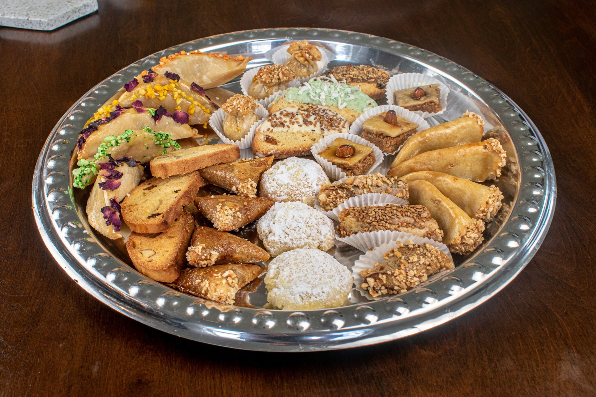 We are one of the most popular Moroccan traditional pastries in Marakesh, Morocco since 1941. We are sharing the taste of Morocco through the moroccan cuisine. We are selling the best and most authentic Moroccan cookies, Moroccan sweets, Moroccan desserts.Such as Chebakya, ghriba, gazelle horns, fekkas, briwat, Mhancha